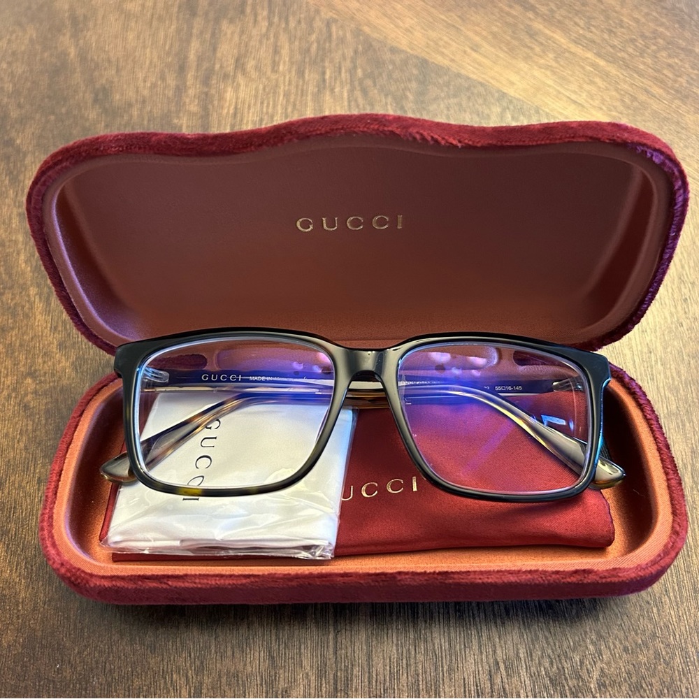 Gucci eyeglass case - hard case, dust bag, and cleaning cloth included.